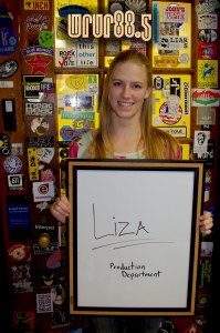 Liza (Productions) in front of the Sticker Door