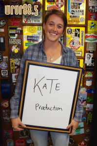 Kate (Productions) in front of the Sticker Door